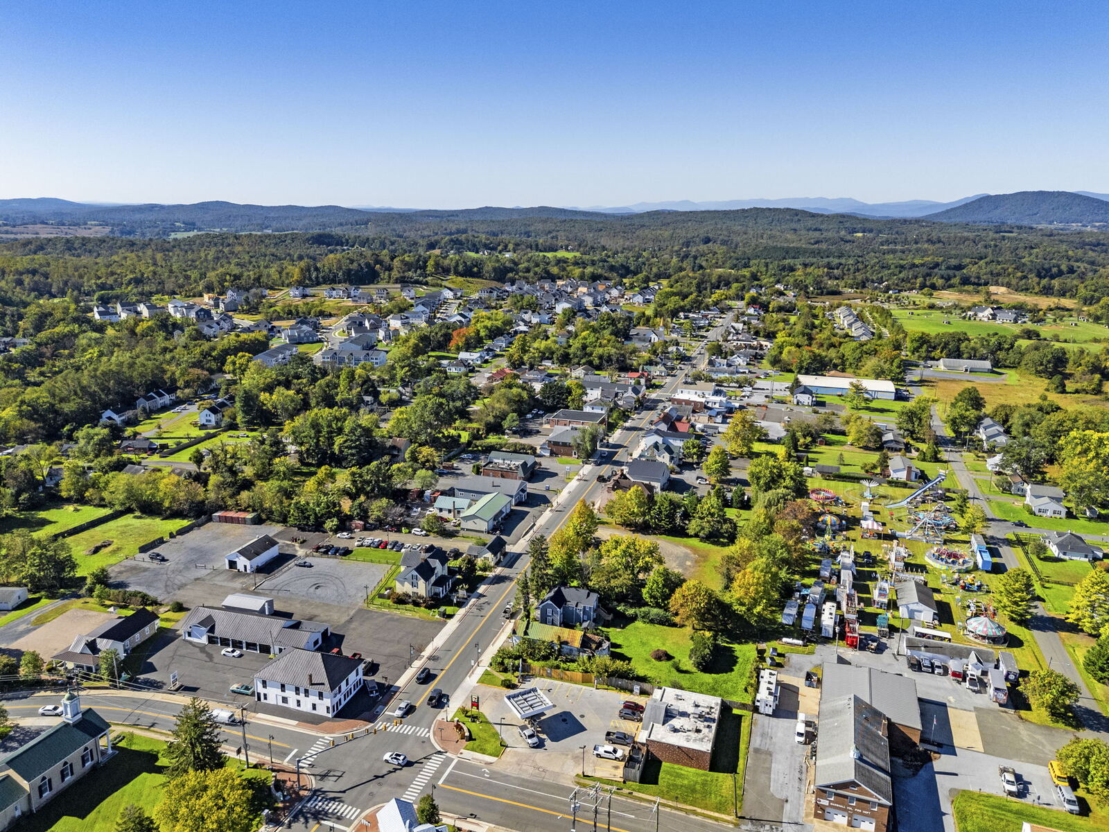 Aerial view of Marshall, Virginia, with rolling hills and mountain ridges on the horizon